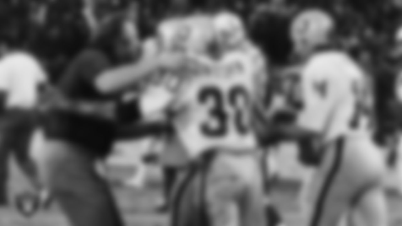 John Madden coached the Raiders to a 103-32-7 record from 1969-1978. During that time, he won five straight AFC West titles and coached the team to victory in Super Bowl XI.