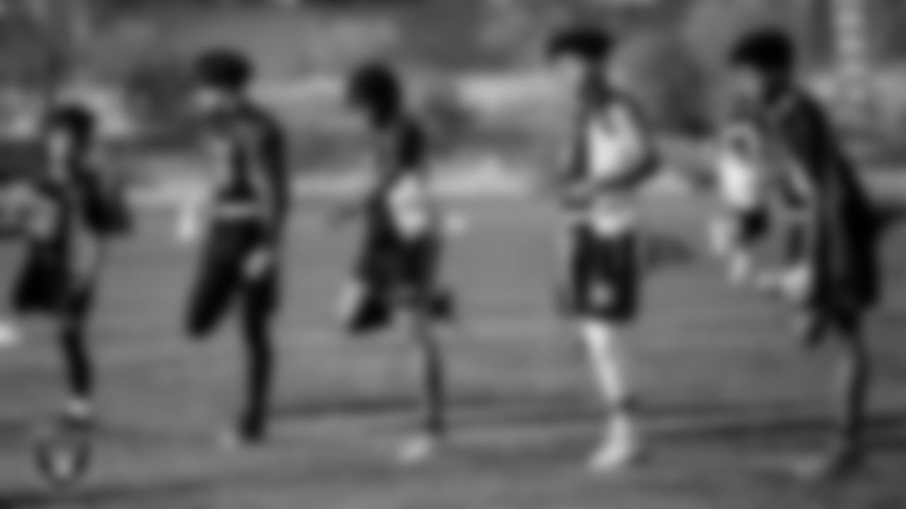 Players stretching during the NFL FLAG Regional Championship.