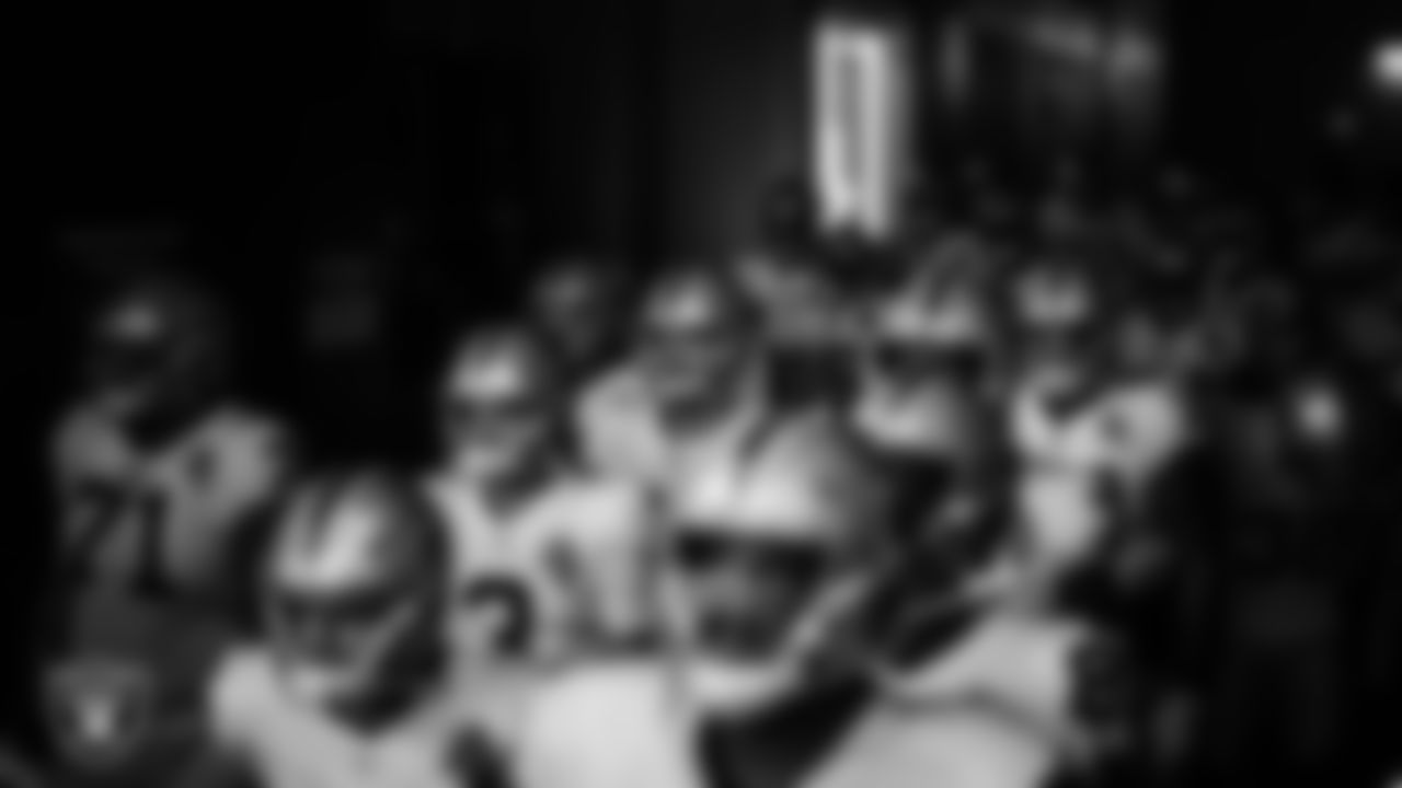 The Las Vegas Raiders wait to be introduced onto the field before the regular season away game against the Atlanta Falcons.