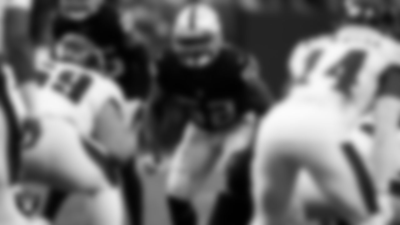 Las Vegas Raiders linebacker Denzel Perryman (52) eyes the quarterback during the regular season home game against the Philadelphia Eagles.