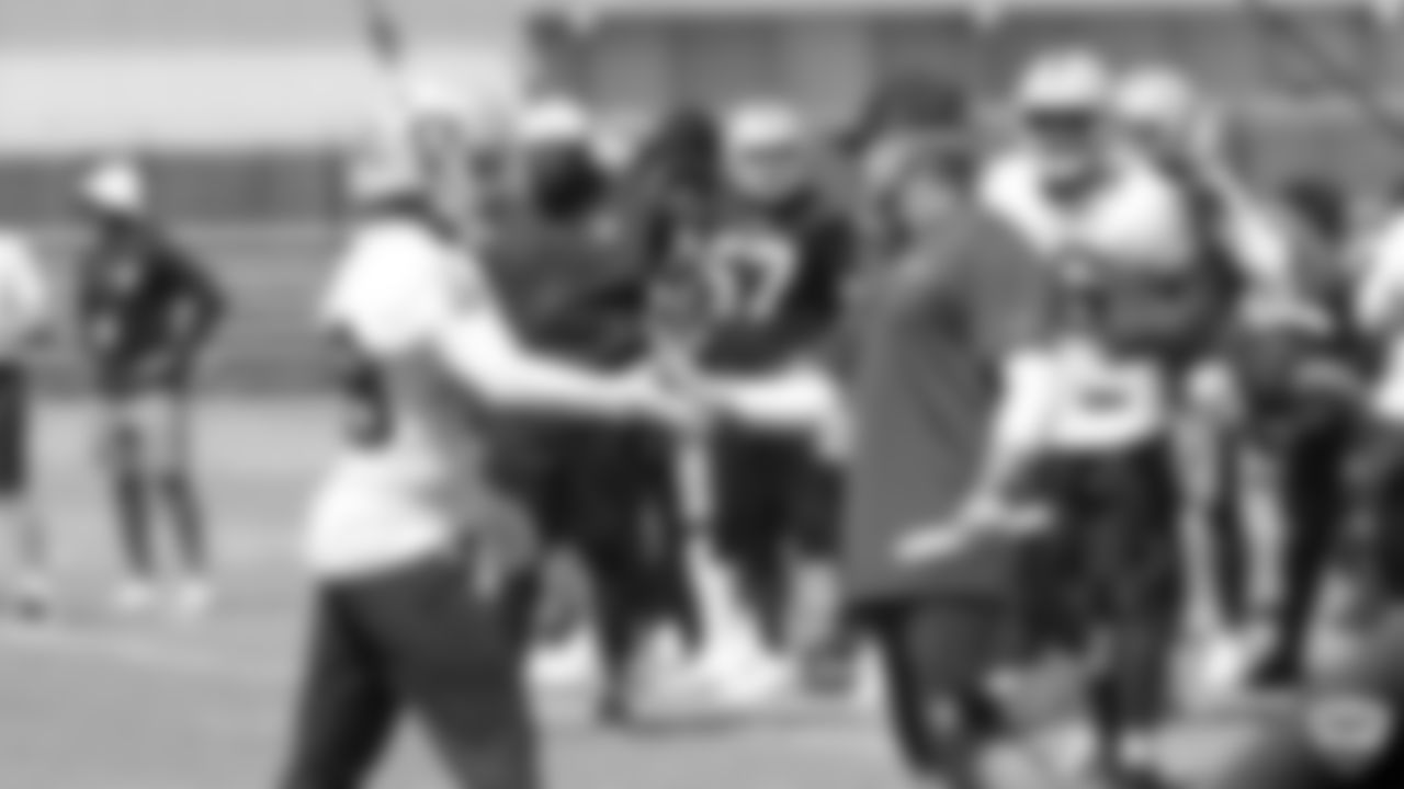 Raiders running back Josh Jacobs (28) and head coach Jon Gruden on the field for practice at 2019 Training Camp.