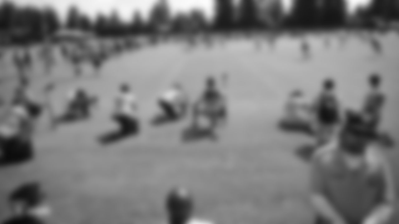 The Hard Knocks film crew on the field for practice at 2019 Training Camp.
