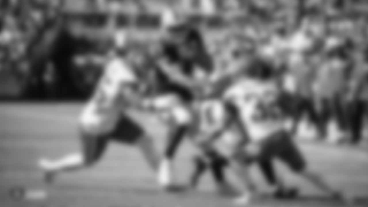 Raiders wide receiver Tyrell Williams (16) blocks for tight end Darren Waller (83) during the Raiders regular season game against the Kansas City Chiefs.