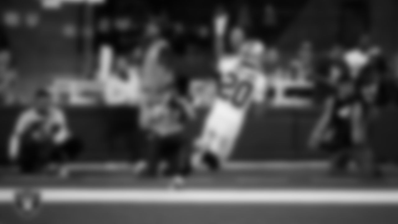 Las Vegas Raiders safety Isaiah Pola-Mao (20) returns an interception for a 50-yard touchdown during the preseason away game against the Los Angeles Rams at Sofi Stadium.