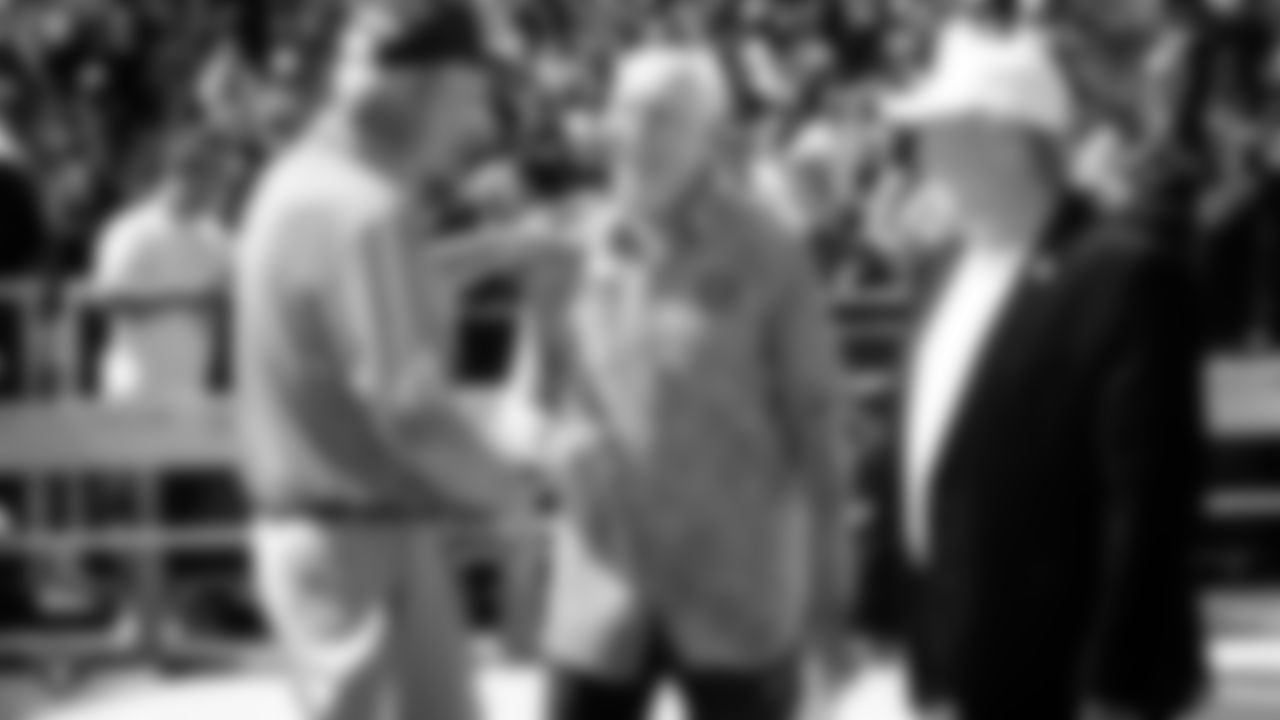 Raiders alumni Fred Biletnikoff and Daryle Lamonica with Owner Mark Davis before the Raiders regular season game against the Kansas Chiefs in 2019.