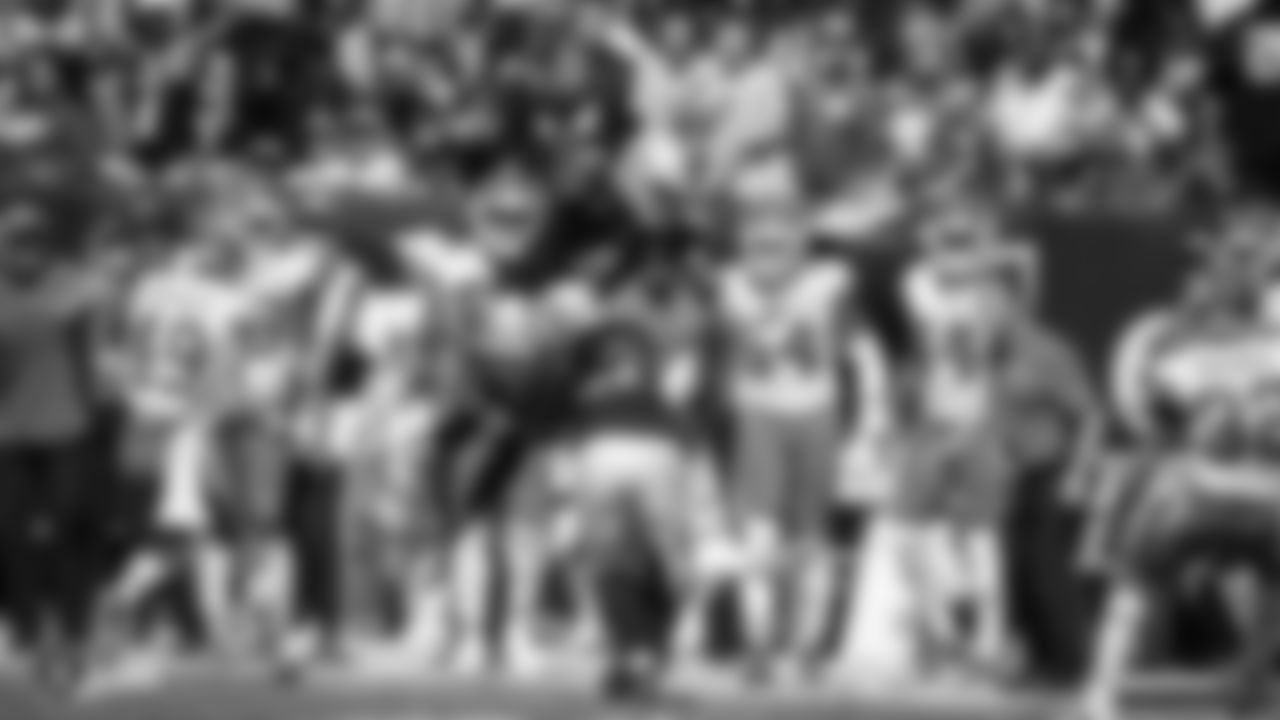 Raiders quarterback Derek Carr (4) looks for the first down during the Raiders regular season game against the Kansas City Chiefs.