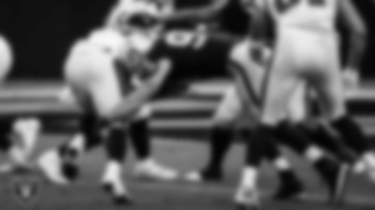 Las Vegas Raiders defensive end Carl Nassib (94) makes a tackle during the regular season home game against the Tampa Bay Buccaneers.