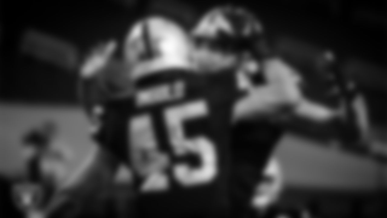 Las Vegas Raiders fullback Alec Ingold (45) celebrates with tight end Foster Moreau (87) after a 3-yard touchdown catch during the regular season home game against the New Orleans Saints.
