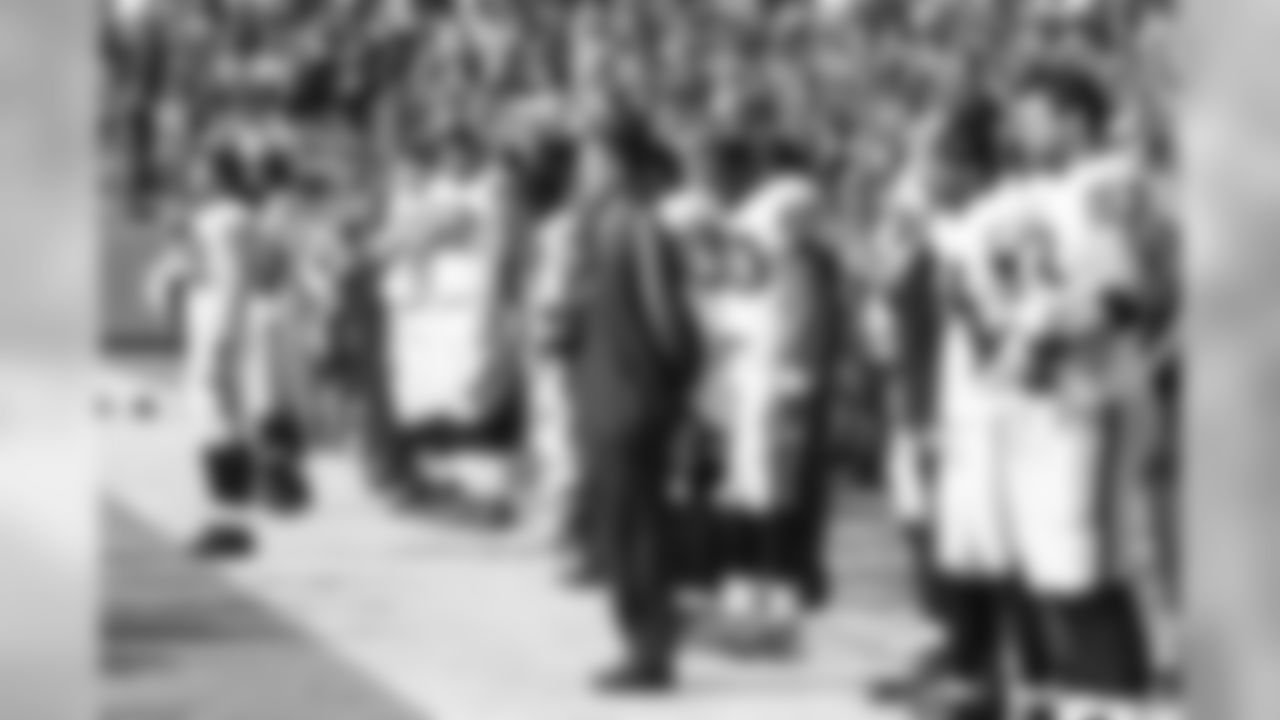 The Raiders sideline during the National Anthem.