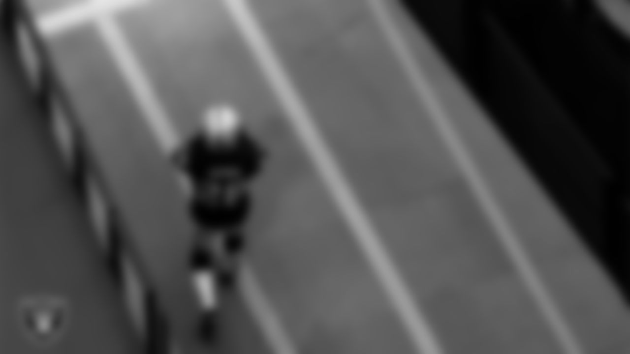 Las Vegas Raiders running back Josh Jacobs (28) walks down the tunnel before the regular season home game against the Denver Broncos.