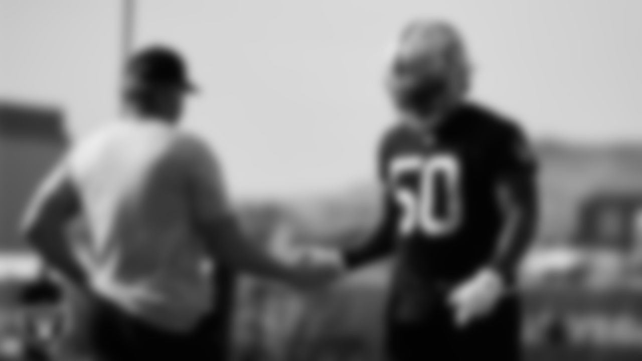 Las Vegas Raiders Head Coach Jon Gruden and linebacker Nicholas Morrow (50) on the field for Mandatory Minicamp.