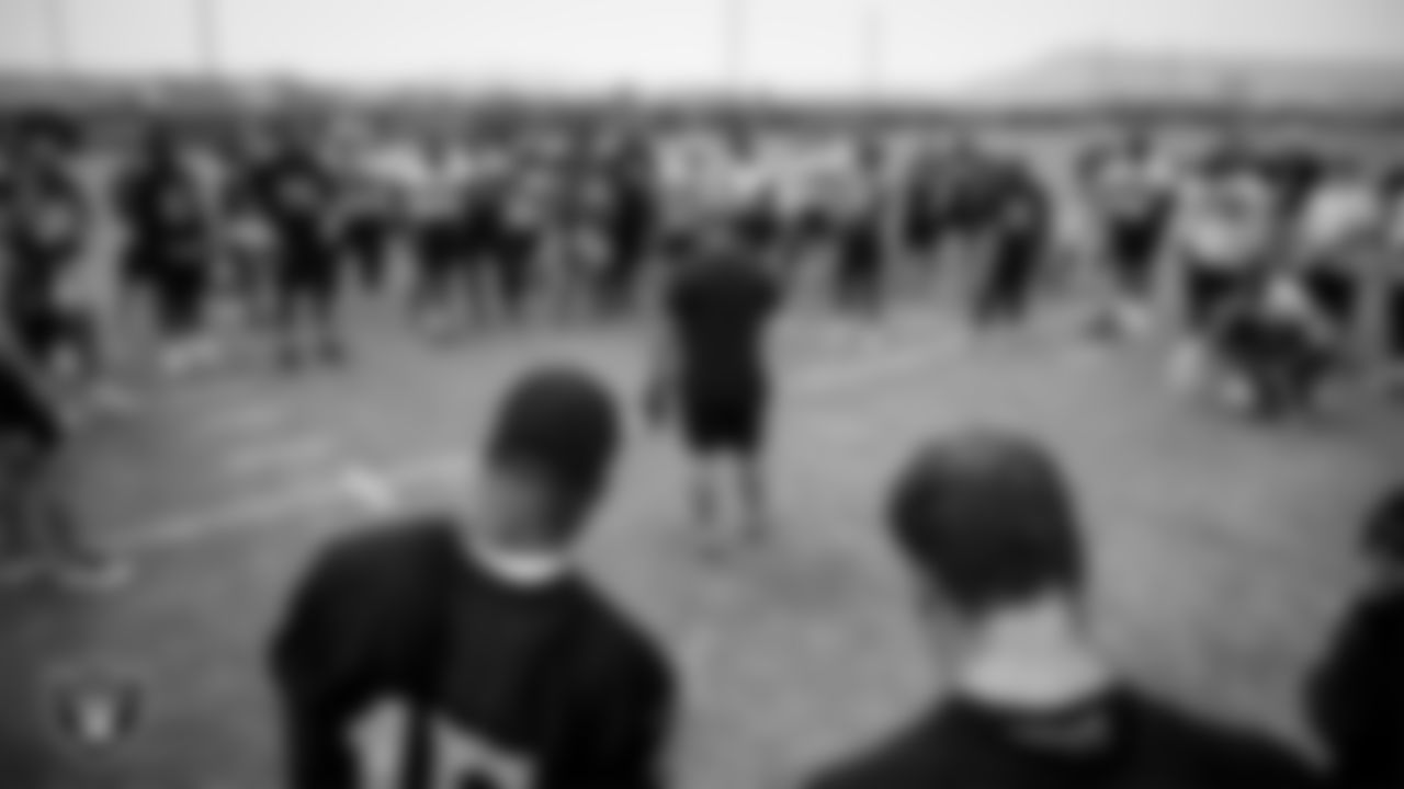 Las Vegas Raiders Head Coach Jon Gruden huddles the team during practice.