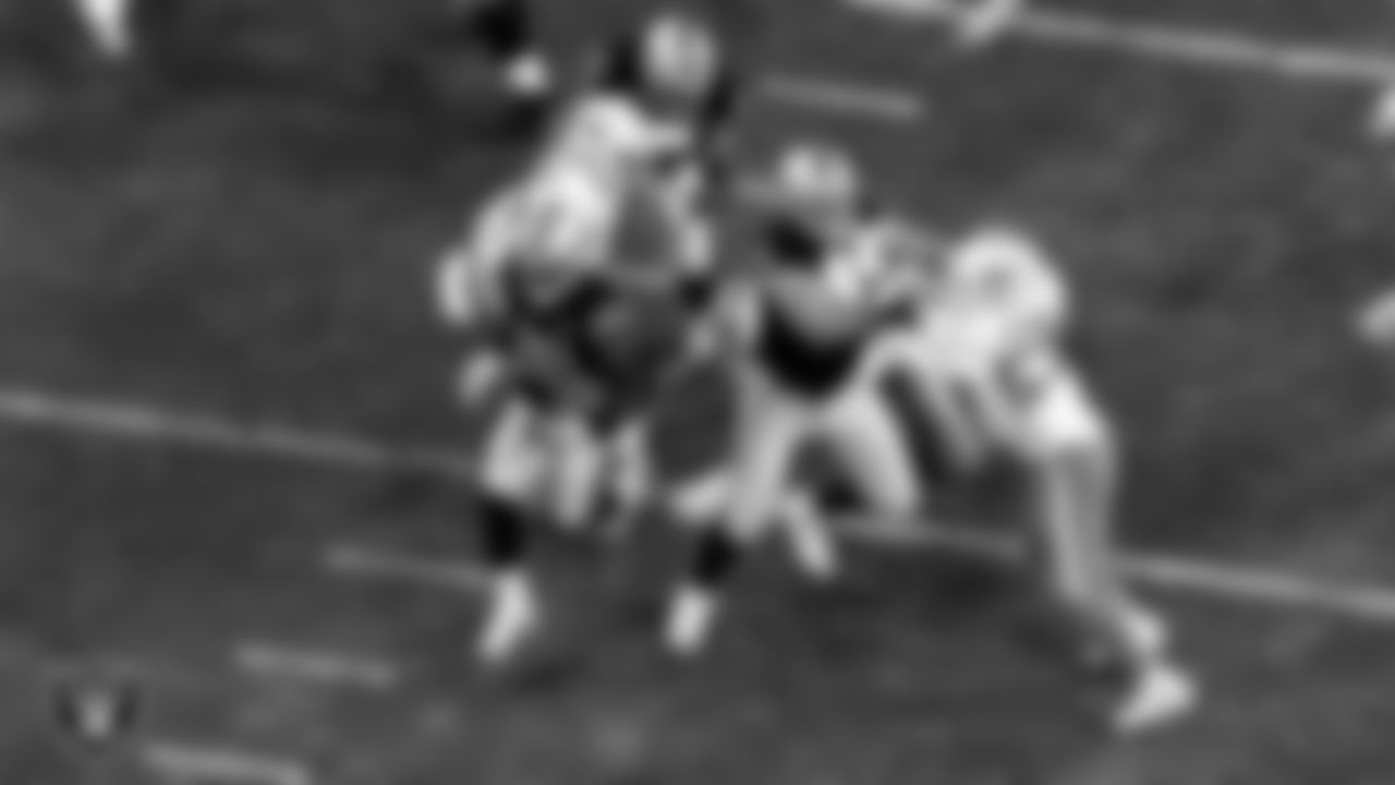 Las Vegas Raiders running back Josh Jacobs (28) rushes during the regular season home game against the Miami Dolphins.