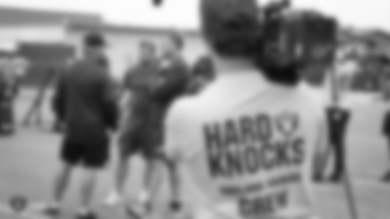The Hard Knocks film crew on the field for a joint practice with the Los Angeles Rams at 2019 Training Camp.
