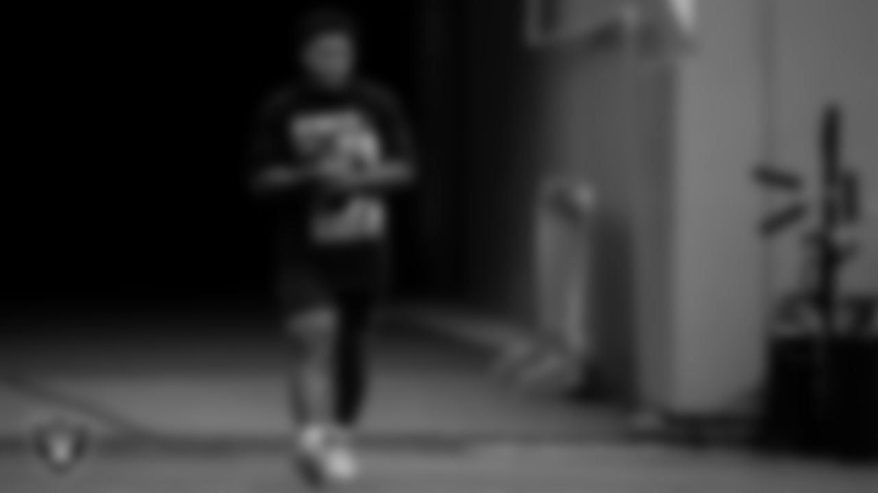 Las Vegas Raiders running back Josh Jacobs (28) walks down the tunnel before the regular season away game against the Tennessee Titans.