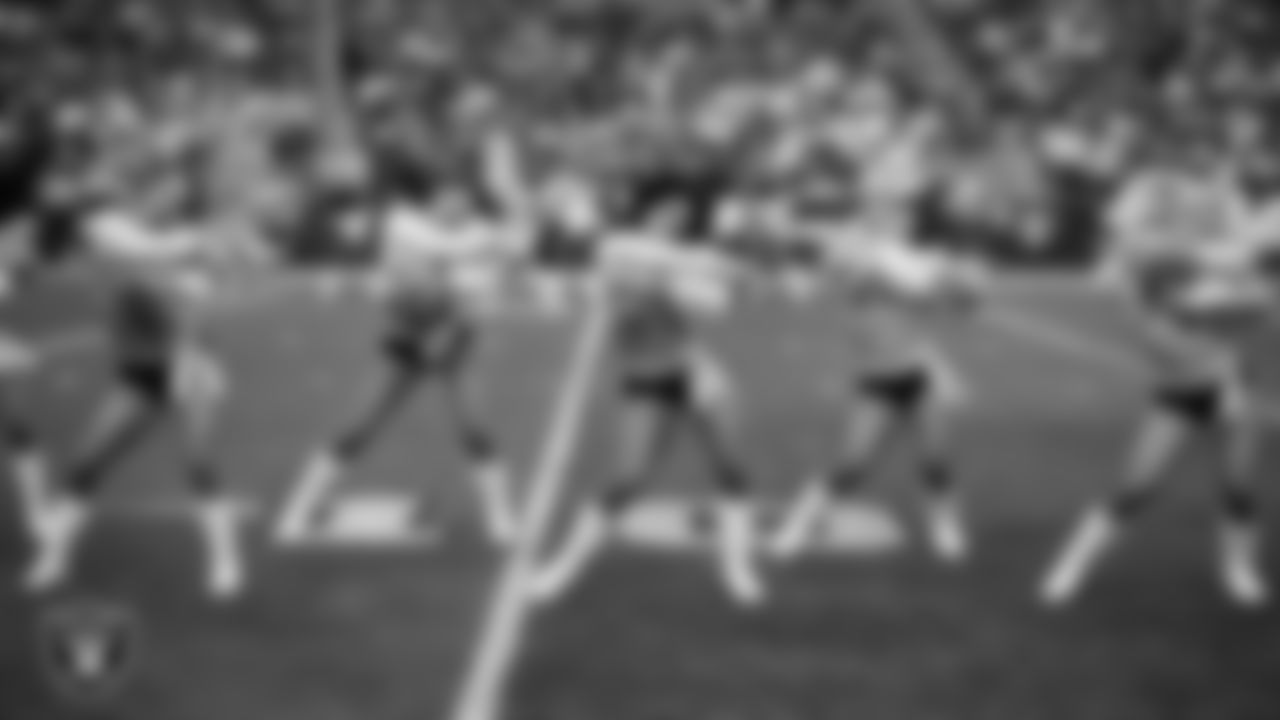 Raiderettes Taylor, Vicky and Jennfier perform on the field during the regular season home game against the Los Angeles Chargers at Allegiant Stadium.