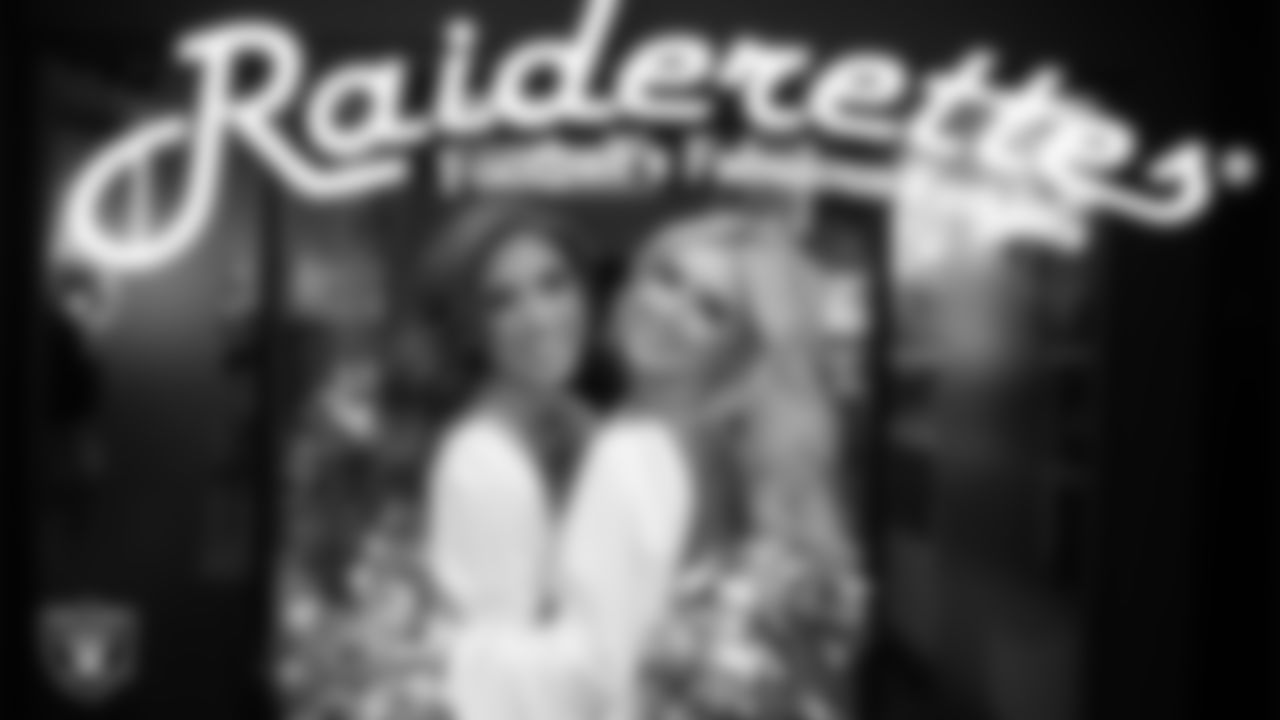 Raiderettes Stephanie and Whitney in the locker room before the regular season home game against the Chicago Bears.