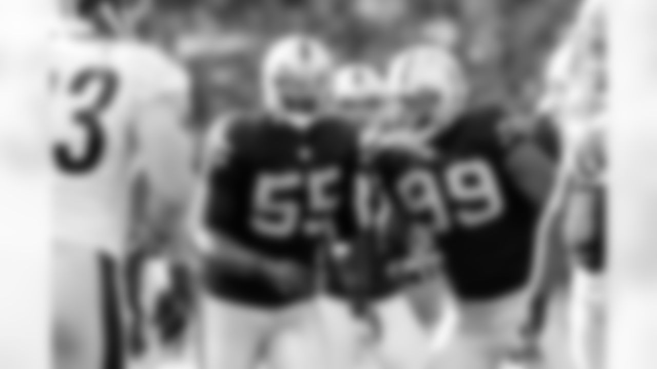 LB Rolando McClain and DE Lamarr Houston