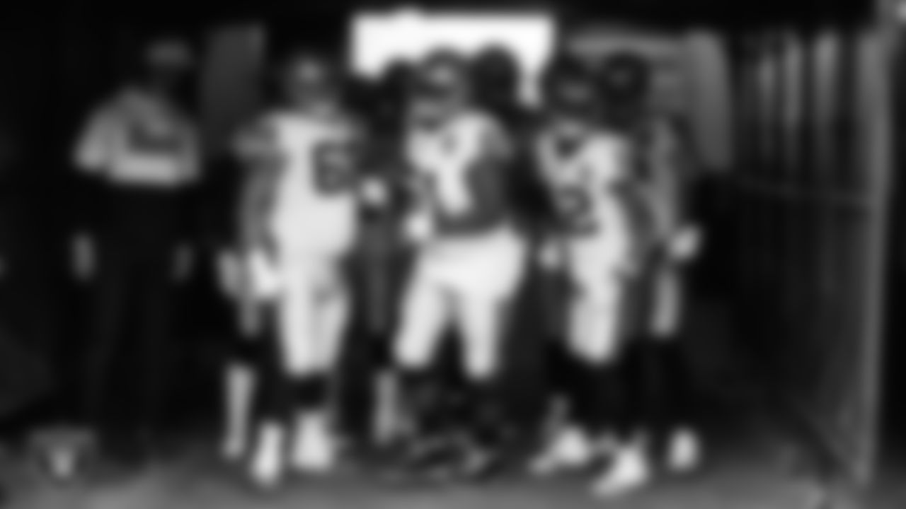 The Las Vegas Raiders huddle in the tunnel before the regular season away game against the Denver Broncos.