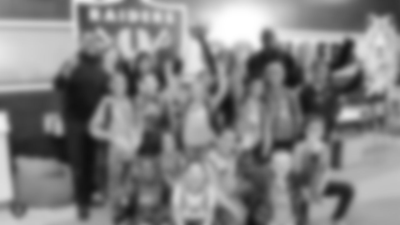 Alumni Reggie Kinlaw and Leo Gray and the Raiderettes return to the Resource Room for Nevada Reading Week at Robert Taylor Elementary School to encourage a love of reading by giving children opportunities to read and be read to on Wednesday, February 27, 2019, in Henderson, Nev.