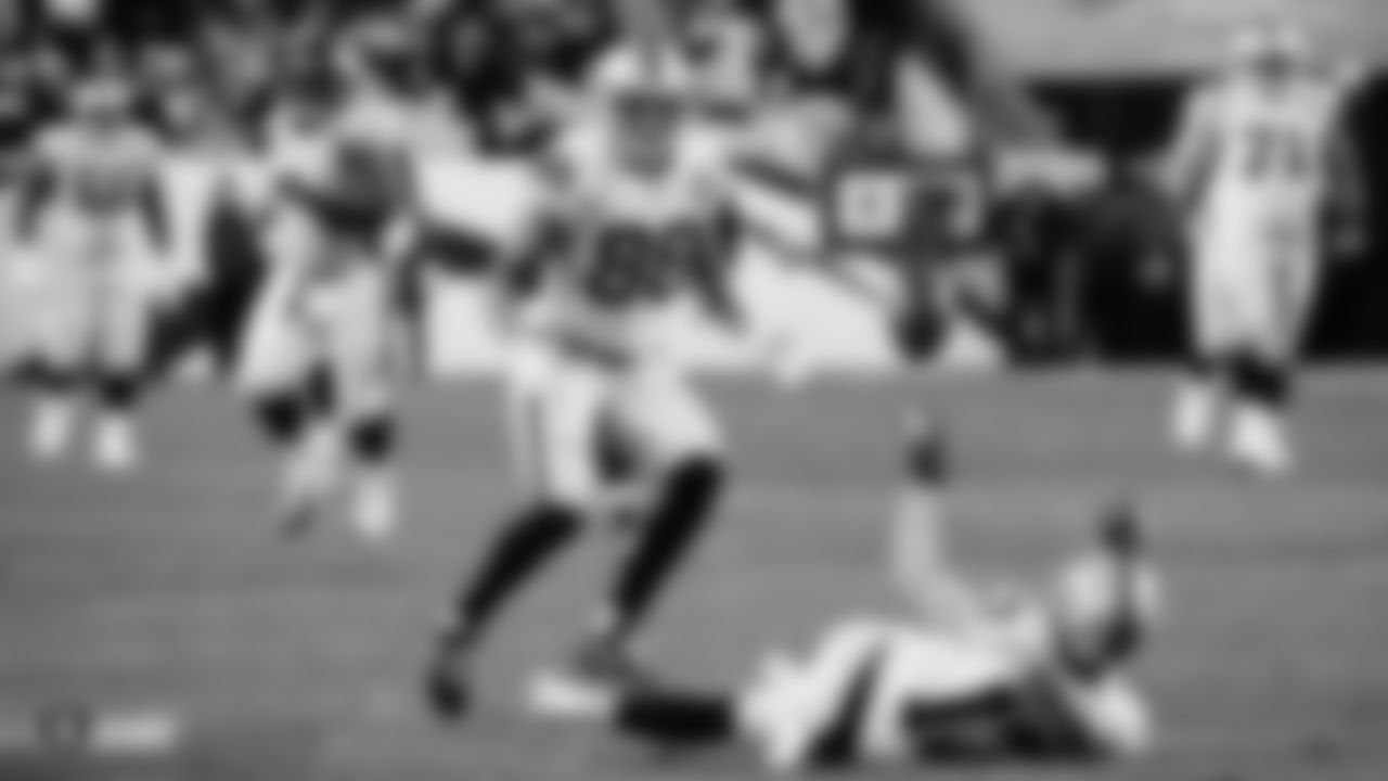 Raiders wide receiver Hunter Renfrow (13) laterals the ball to wide receiver Marcell Ateman (88) during the regular season game against the Denver Broncos.