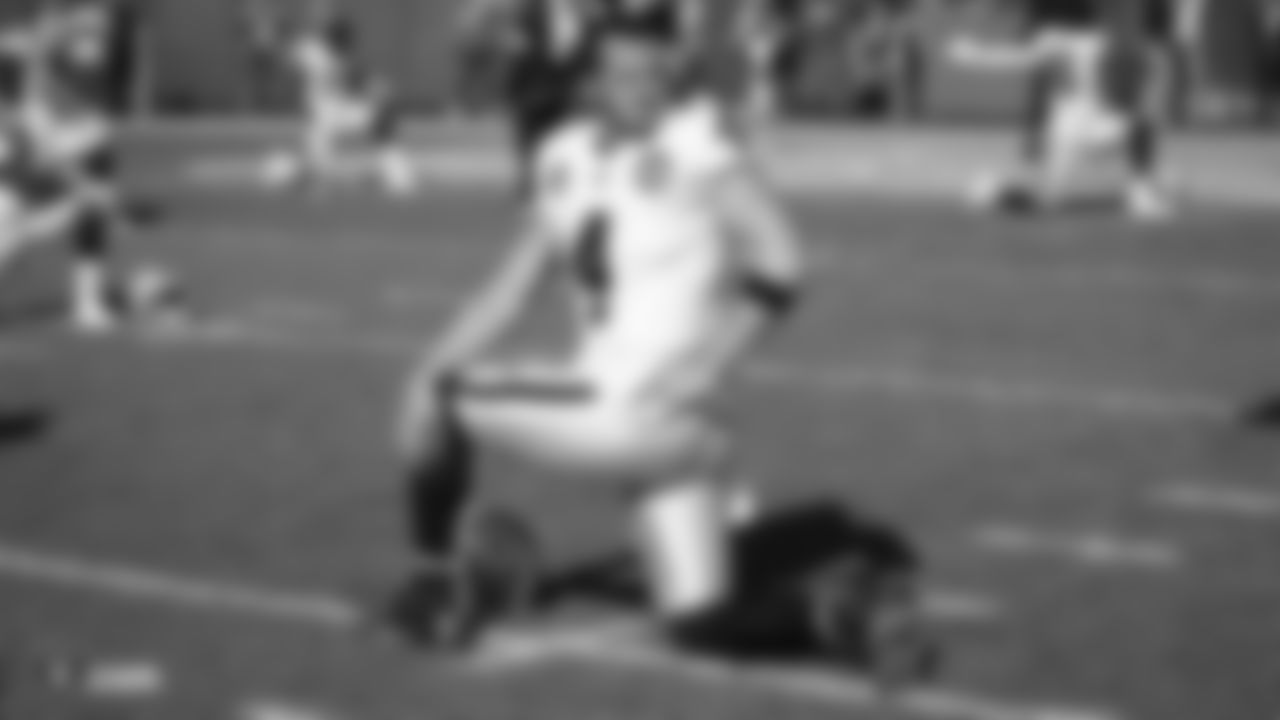 Raiders quarterback Derek Carr (4) warms up before the regular season game against the Green Bay Packers at Lambeau Field.