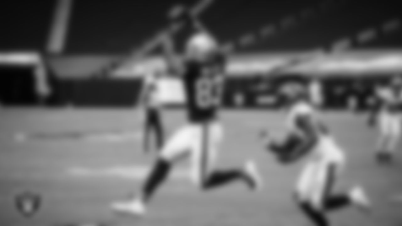 Las Vegas Raiders tight end Darren Waller (83) goes up for a catch during the regular season home game against the Tampa Bay Buccaneers.