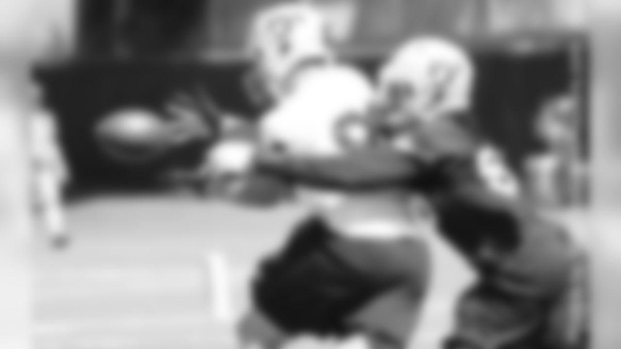 Two players attempt to make a catch