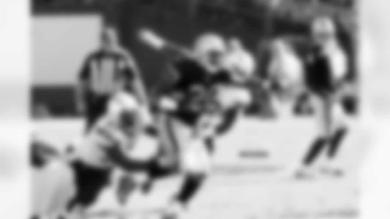 RB Darren McFadden powers his way through the tackle.