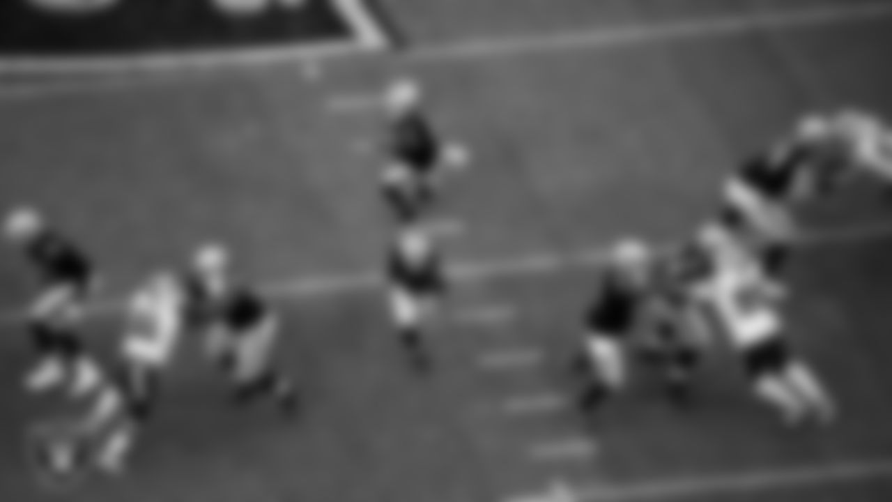 Las Vegas Raiders quarterback Derek Carr (4) looks for a receiver as tackle Sam Young (70), guard Gabe Jackson (66), center Rodney Hudson (61), tackle Denzelle Good (71) and tackle Kolton Miller (74) block during the regular season home game against the Buffalo Bills.