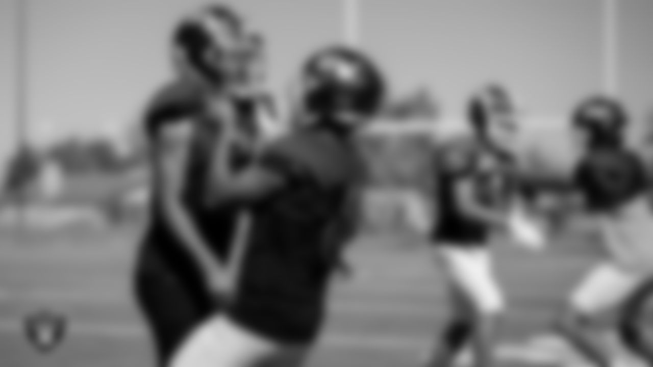 Members of the Green Valley High School football team go through a drill during practice at Green Valley High School.