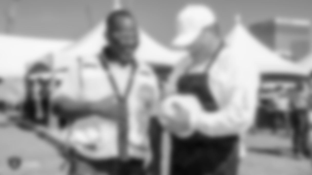 Raiders owner Mark Davis, president Marc Badain, and staff members from the Raiders front office spend the day with construction workers of the Las Vegas Stadium worksite by handing out lunches and sharing a meal, Thursday, September 27, 2018, at the Las Vegas Stadium worksite in Las Vegas, Nevada.