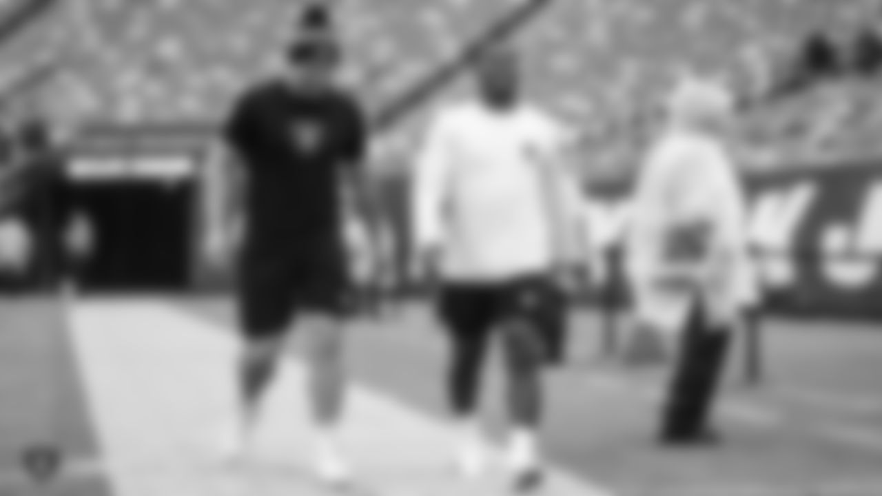 The Raiders warm up before the regular season game against the New York Jets at MetLife Stadium.