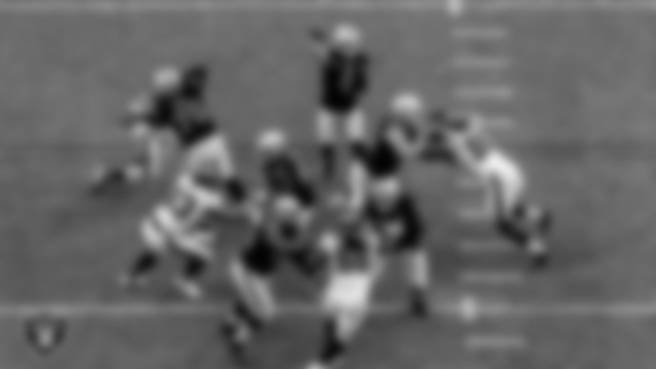 Las Vegas Raiders tackle Sam Young (70), center Rodney Hudson (61), guard Gabe Jackson (66), tackle Denzelle Good (71) and tackle Kolton Miller (74) block as quarterback Derek Carr (4) passes during the regular season home game against the Tampa Bay Buccaneers.