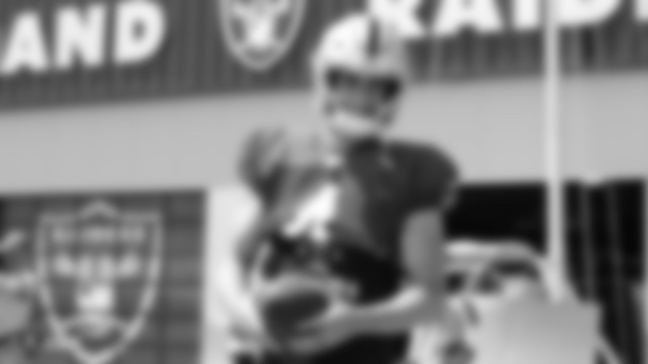Raiders quarterback Derek Carr (4) on the field for a preseason practice.