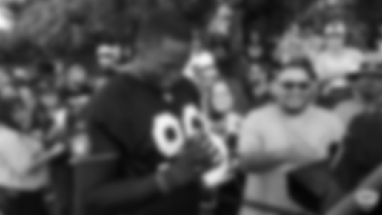 Raiders defensive end Clelin Ferrell (96) signs autographs for fans after practice at 2019 Training Camp.