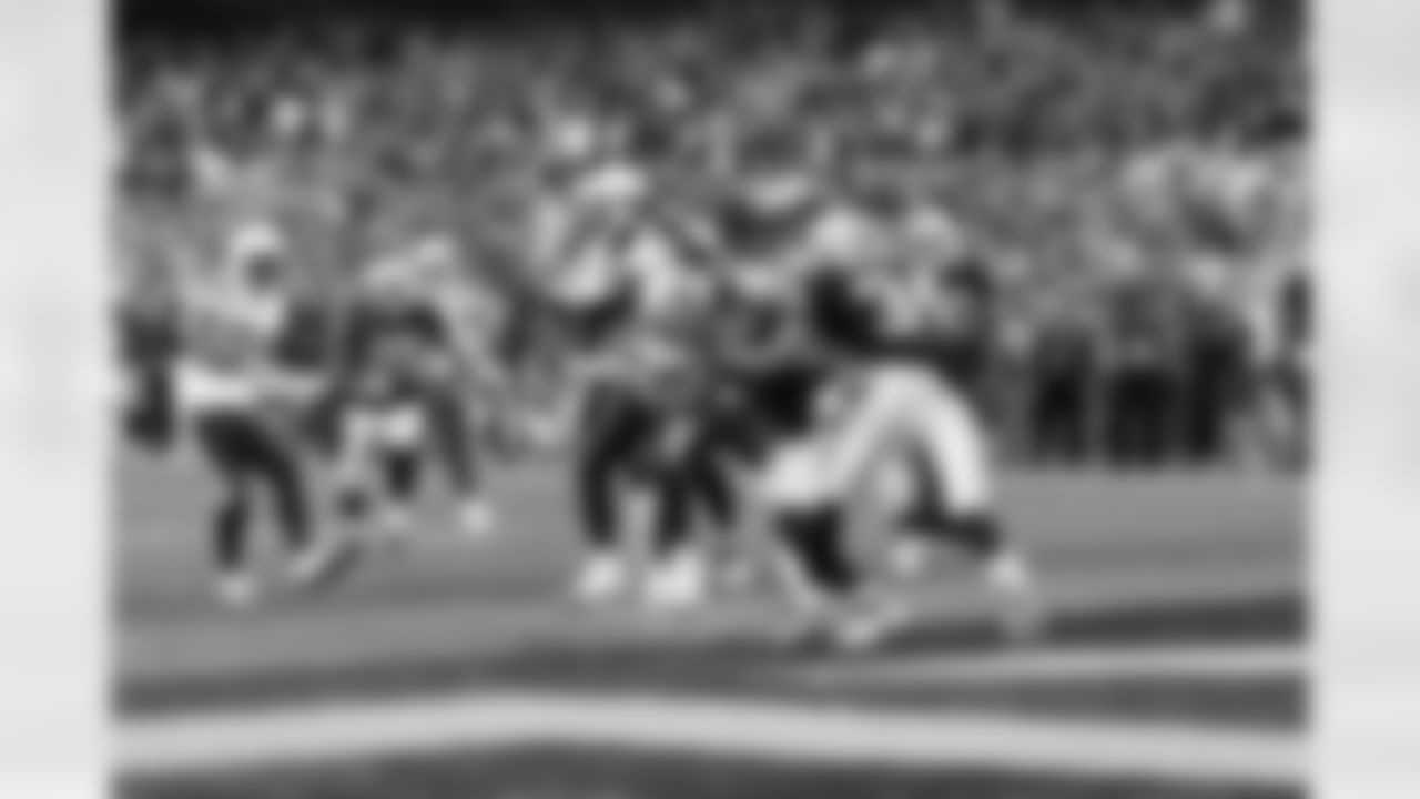 LB Quentin Groves wraps up the kick returner for a near safety.