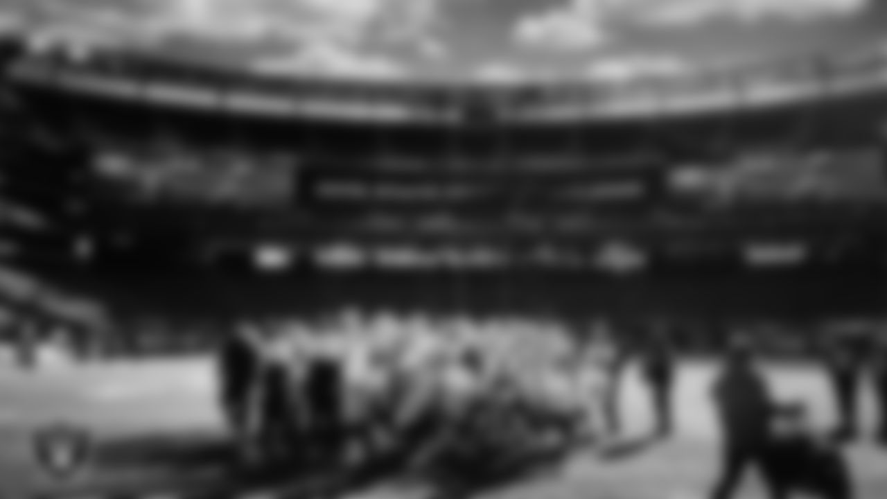 The Las Vegas Raiders huddle before the regular season away game against the New York Jets.