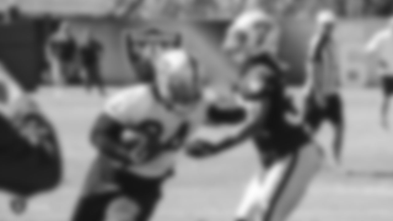 Oakland Raiders running back Marshawn Lynch (24) and defensive back Tevin Mitchel (37) at a Mandatory Mini Camp at the Oakland Raiders Practice Facility, Tuesday, June 12, 2018, in Alameda, California.