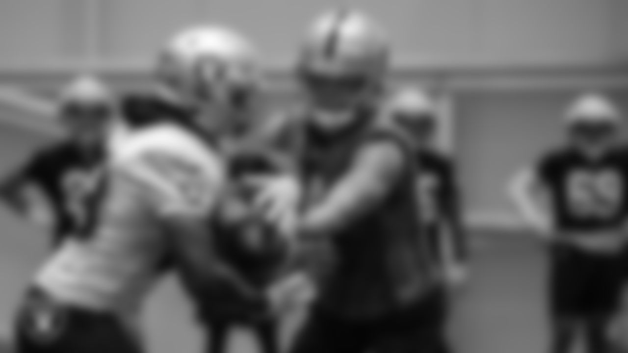 Las Vegas Raiders running back Josh Jacobs (28) and quarterback Derek Carr (4) on the field for practice at 2022 Training Camp at Intermountain Healthcare Performance Center.