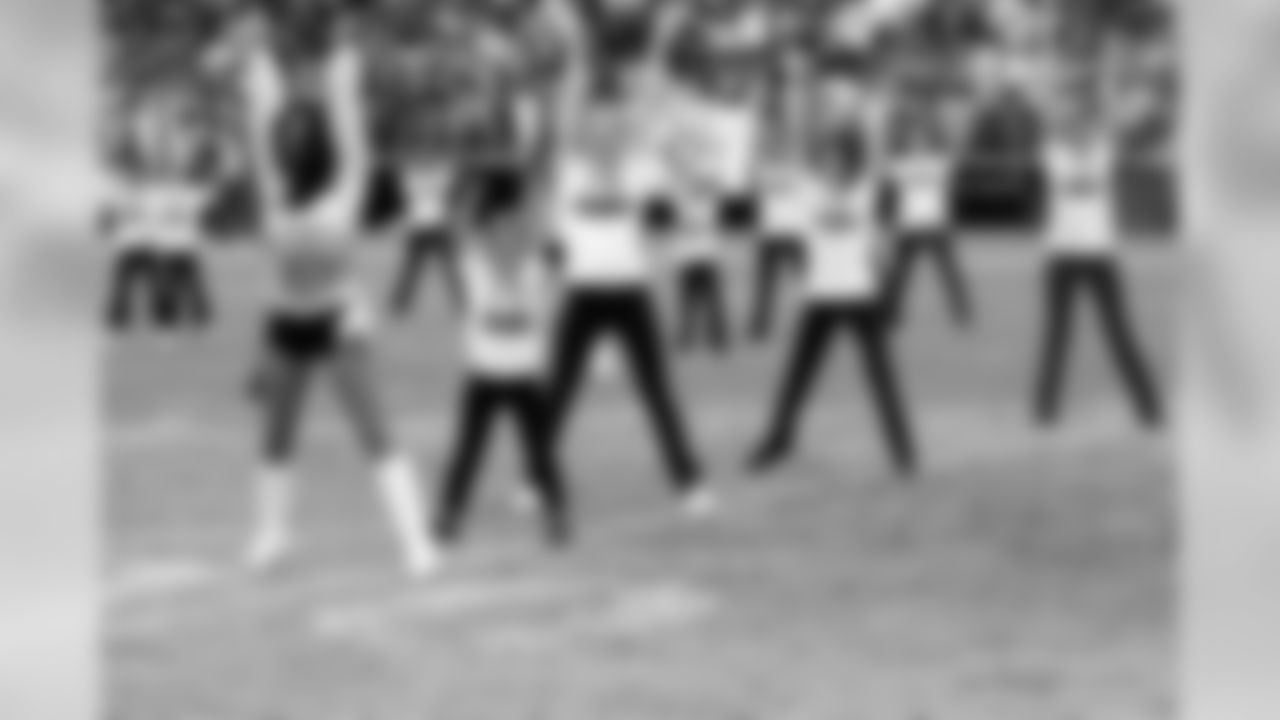 Dance studios perform with the Raiderettes at halftime.