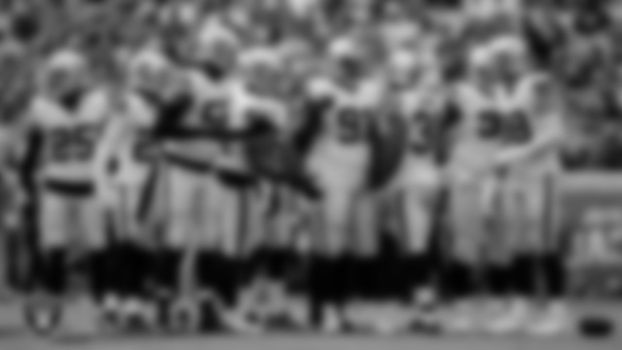 The Las Vegas Raiders defense huddles during the regular season away game against the Jacksonville Jaguars at TIAA Bank Field.