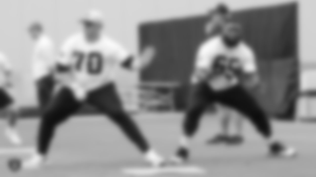 Raiders offensive lineman Jordan Devey (70) and guard Chaz Green (65) at a workout during phase two of the offseason program at the Raiders Practice Facility in Alameda, Calif.