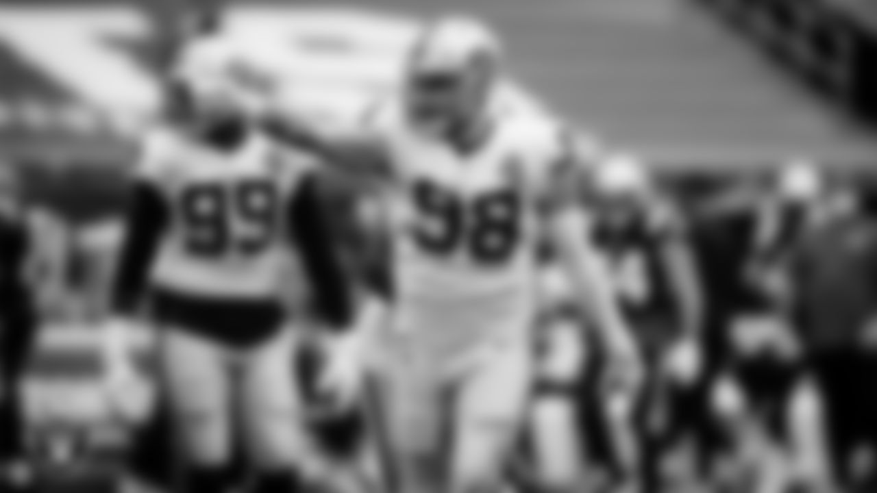 Las Vegas Raiders defensive end Maxx Crosby (98) celebrates after sacking the quarterback during the regular season away game against the New England Patriots.