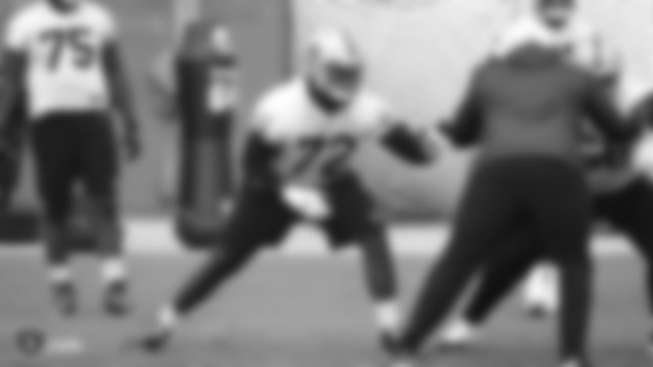 Raiders tackle David Sharpe (72) goes through offensive drills during practice.