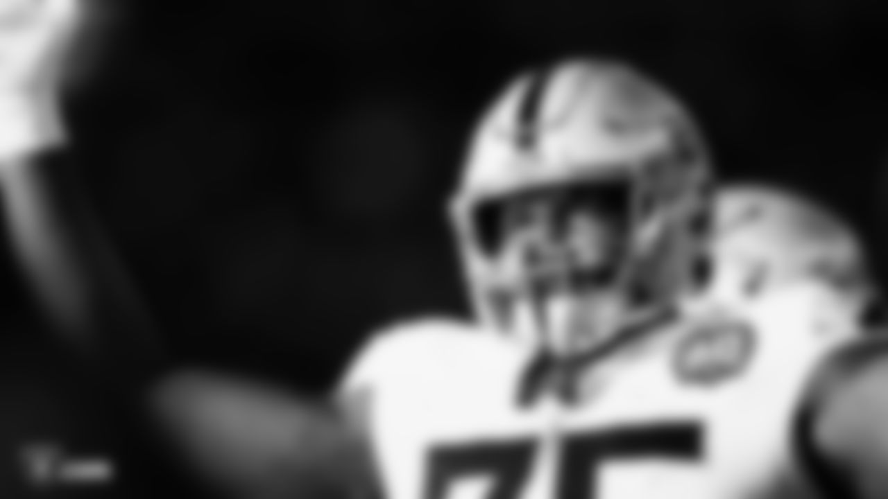 Raiders tackle Brandon Parker (75) stands on the field during the regular season game against the Denver Broncos.