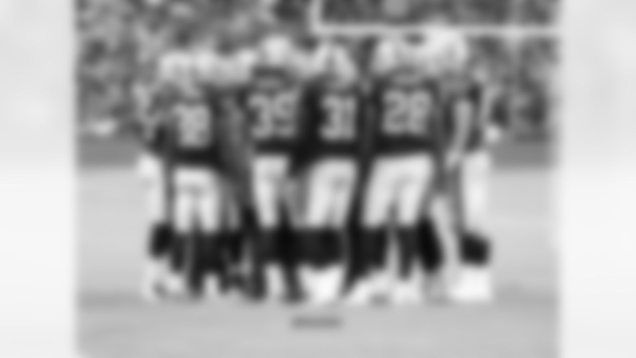 Special teams huddles before taking the field for the play.