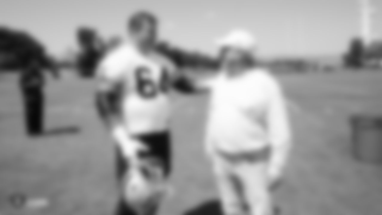 Raiders guard Richie Incognito (64) and owner Mark Davis at a Mandatory Minicamp at the Raiders Practice Facility in Alameda, Calif.