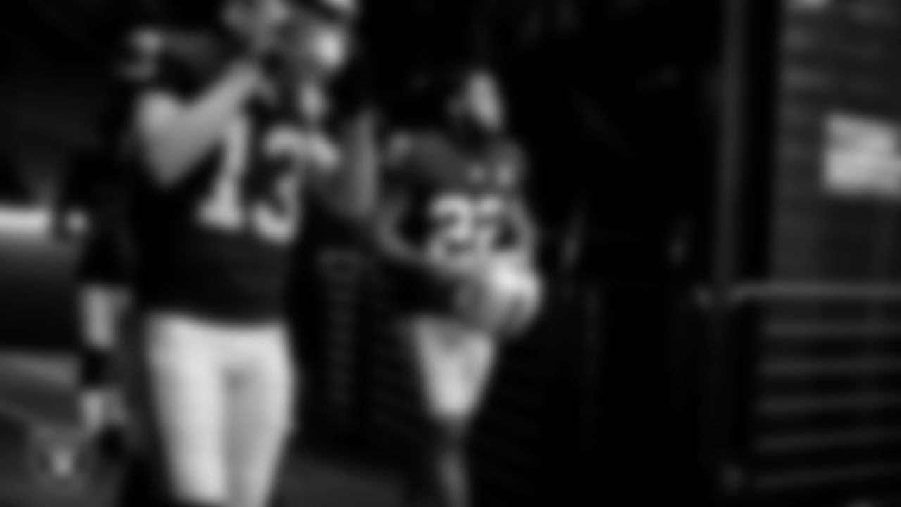 The Raiders walk down the tunnel before the regular season game against the Denver Broncos at Allegiant Stadium.