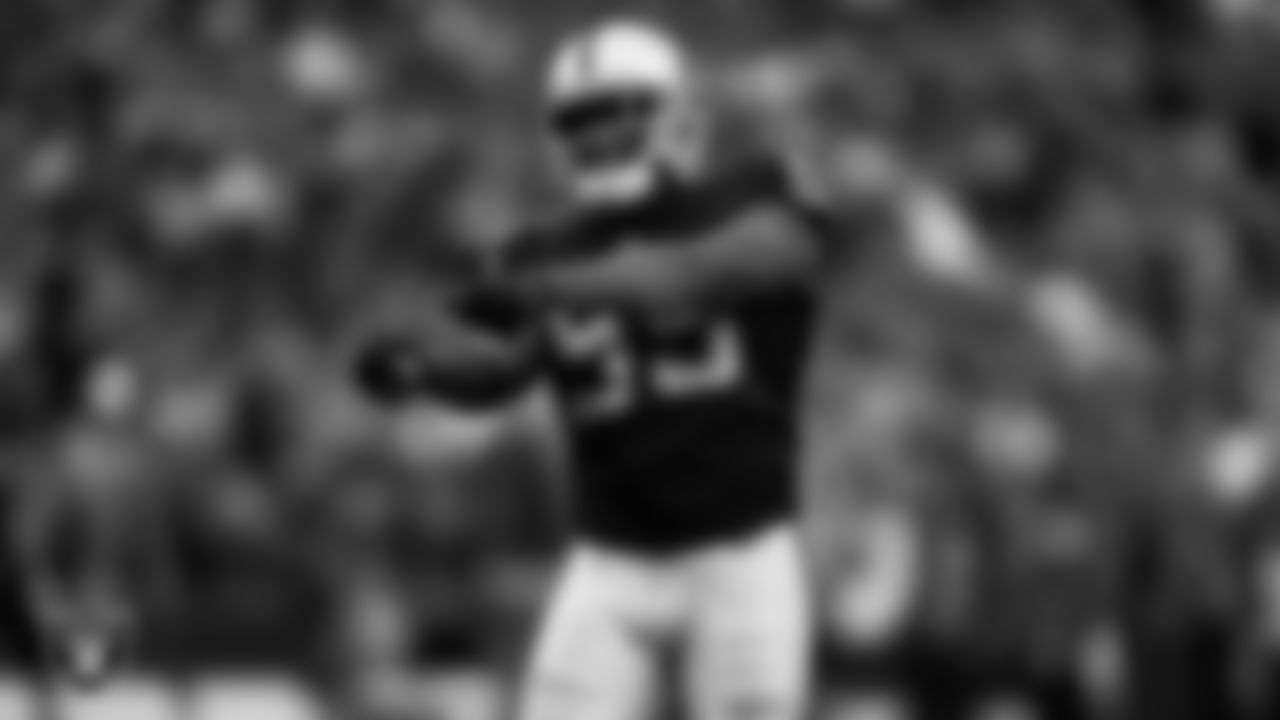 Las Vegas Raiders defensive end Clelin Ferrell (99) celebrates after sacking the quarterback with defensive end Chandler Jones (55) during the regular season home game against the Houston Texans at Allegiant Stadium.